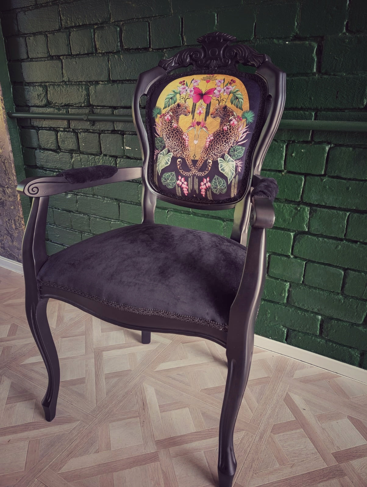 Louis style statement chair, botanical leopard print. Eclectic, maximalist. Sprayed black.