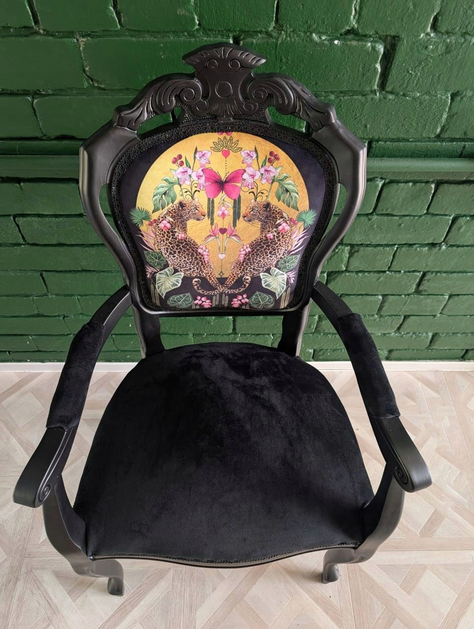 Louis style statement chair, botanical leopard print. Eclectic, maximalist. Sprayed black.